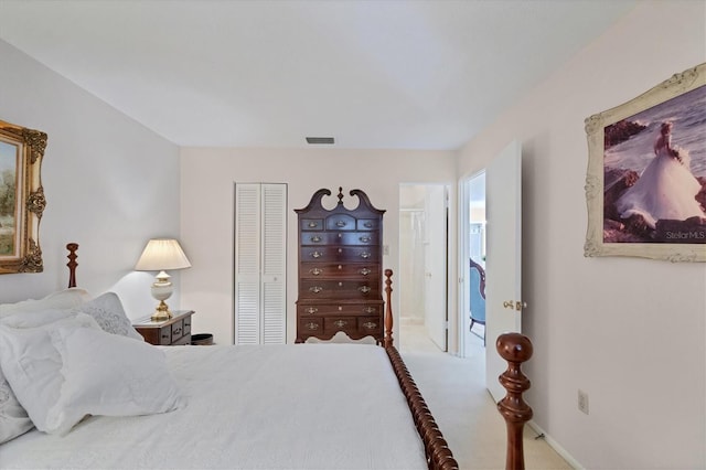 bedroom with a closet and carpet