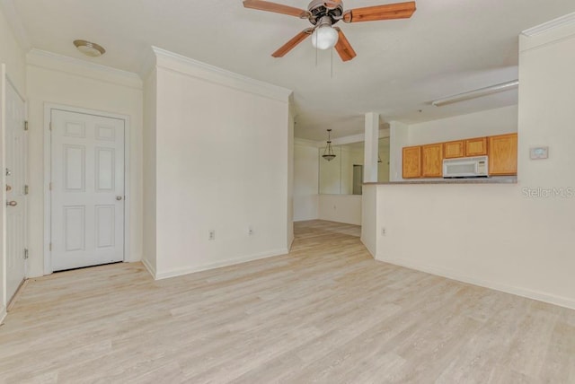 unfurnished living room featuring ceiling fan, light hardwood / wood-style floors, and crown molding