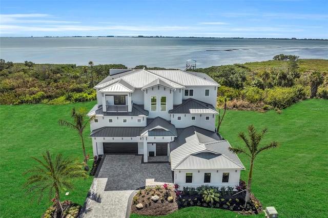 drone / aerial view featuring a water view