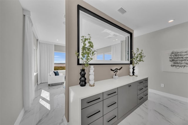 bathroom featuring vanity, tile floors, and a wealth of natural light