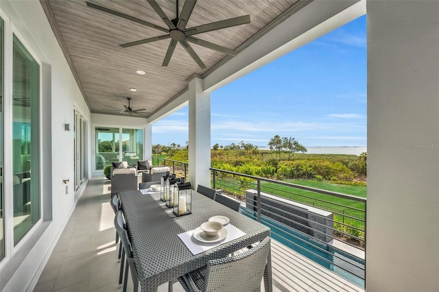 balcony featuring an outdoor hangout area and ceiling fan