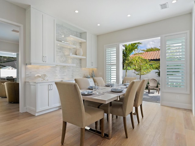 dining room featuring light hardwood / wood-style flooring