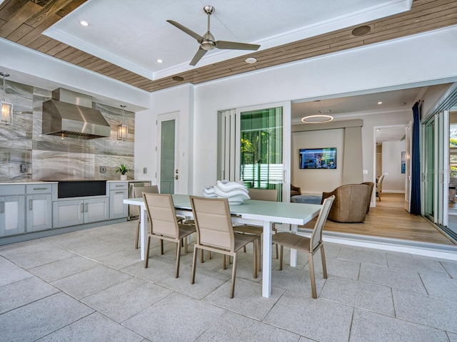 dining room featuring light tile flooring and a wealth of natural light