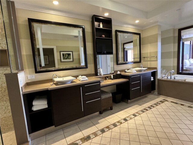 bathroom featuring a bathing tub, tile flooring, crown molding, and dual bowl vanity