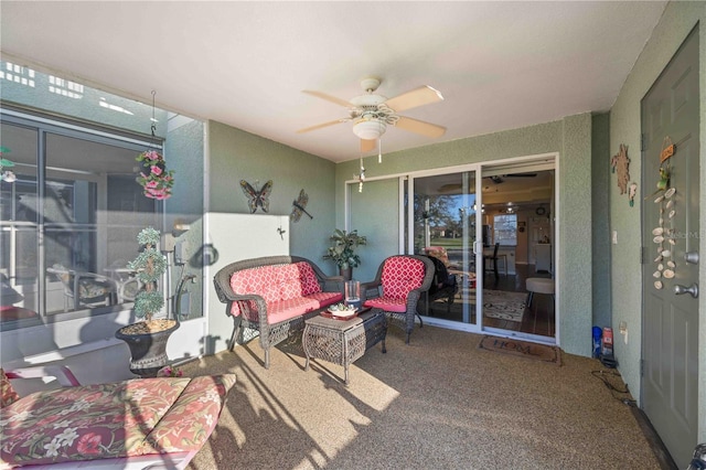 sunroom / solarium with ceiling fan