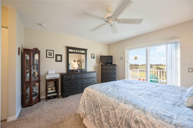 bedroom with ceiling fan, light colored carpet, and access to outside