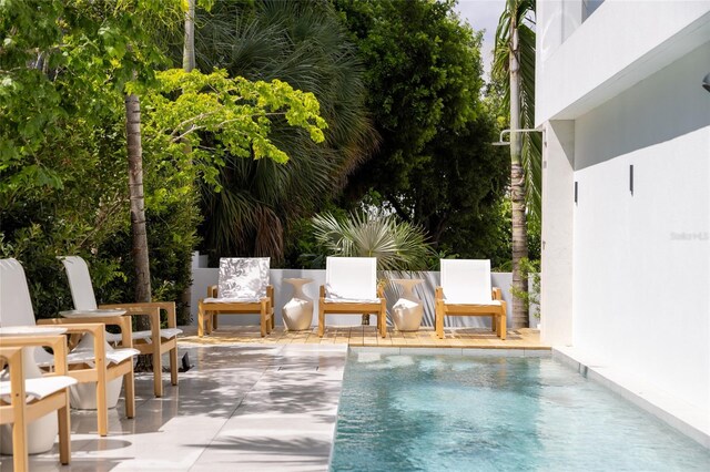 view of pool with a patio