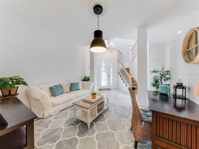 living room featuring an inviting chandelier