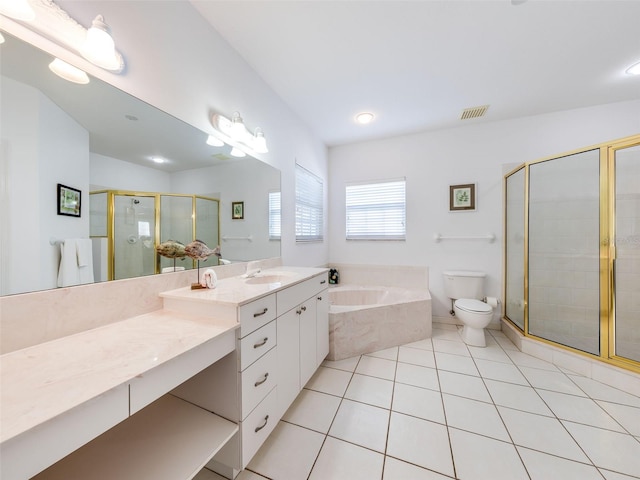 full bathroom featuring tile floors, large vanity, toilet, and separate shower and tub