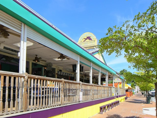 view of home's exterior featuring ceiling fan