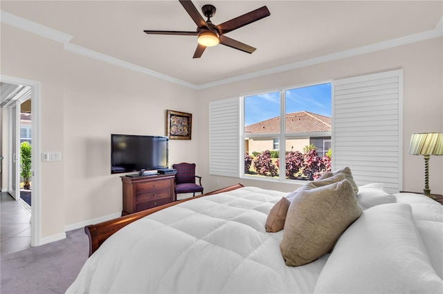 carpeted bedroom featuring ceiling fan, access to exterior, and crown molding