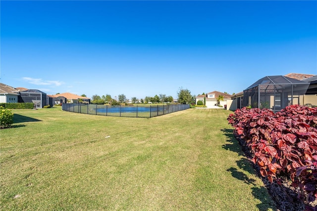 view of yard featuring a lanai and a pool