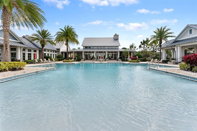 view of pool featuring a patio area