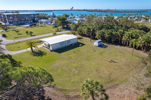 drone / aerial view featuring a water view