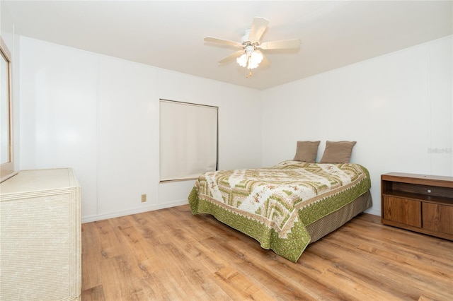 bedroom featuring ceiling fan and light wood-type flooring