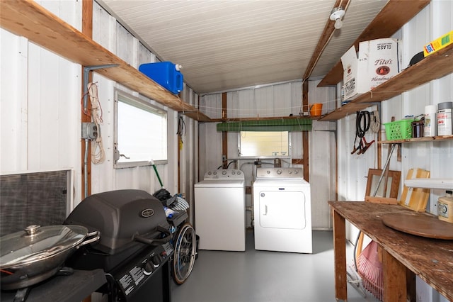 washroom with washing machine and clothes dryer