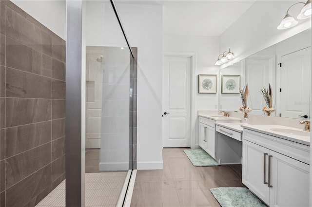 bathroom with walk in shower, tile floors, and double vanity