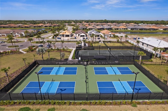 view of basketball court featuring tennis court