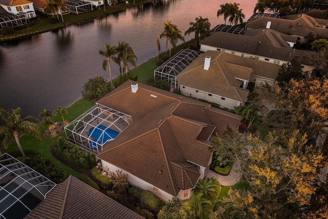 drone / aerial view with a water view