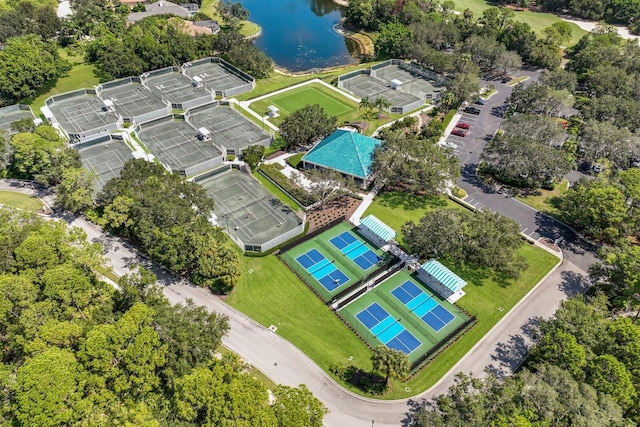 birds eye view of property with a water view