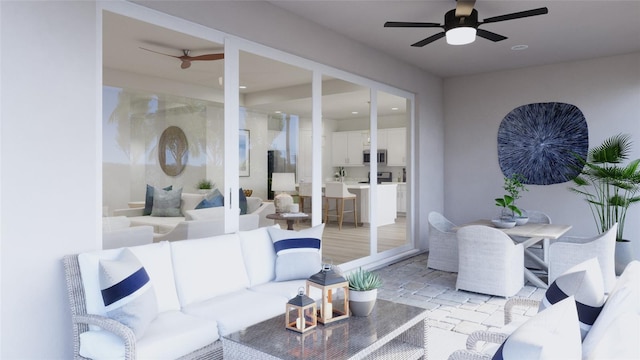 view of terrace featuring an outdoor hangout area and ceiling fan