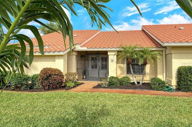 view of front of home with a front yard