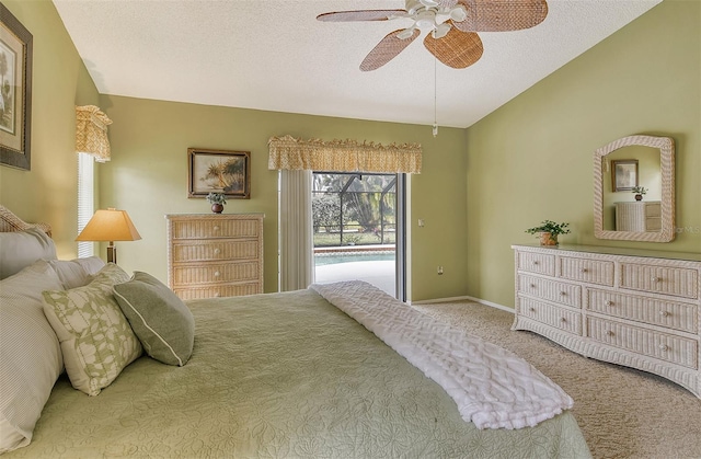 bedroom with access to outside, ceiling fan, carpet flooring, and a textured ceiling