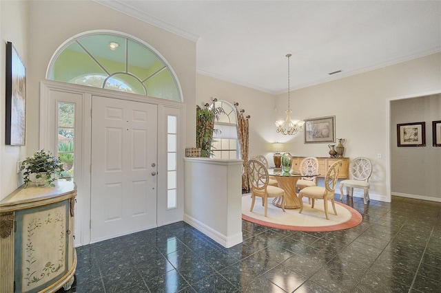 tiled foyer entrance featuring a notable chandelier and crown molding