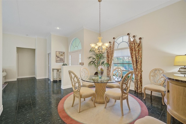 dining room with an inviting chandelier, dark tile flooring, and crown molding