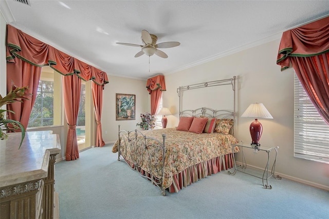 carpeted bedroom featuring ornamental molding, access to exterior, and ceiling fan