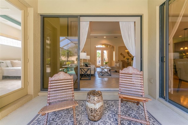 living area featuring light carpet