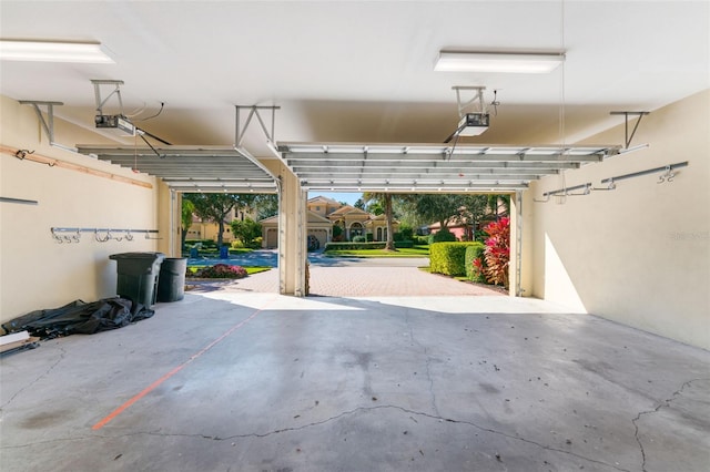 garage featuring a garage door opener