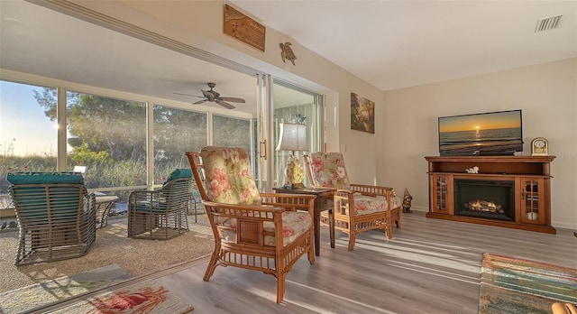 interior space featuring ceiling fan