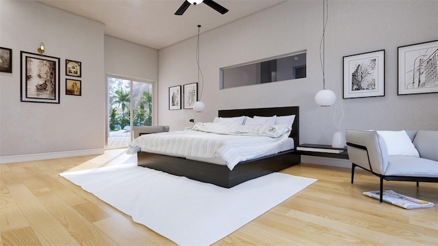 bedroom with ceiling fan and light hardwood / wood-style flooring