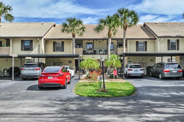 view of property featuring a carport