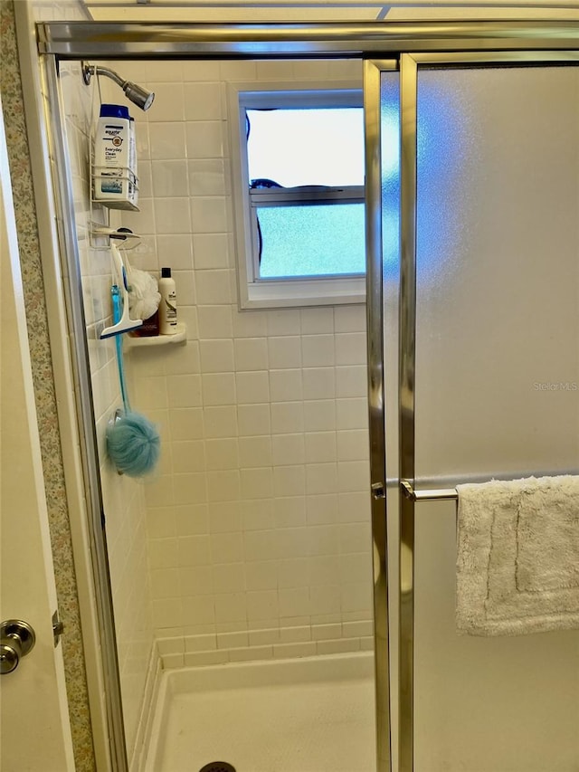 bathroom with walk in shower