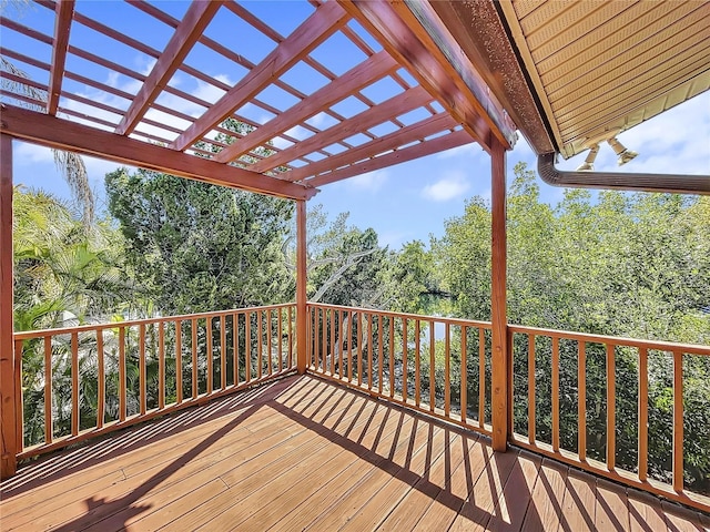 wooden terrace with a pergola