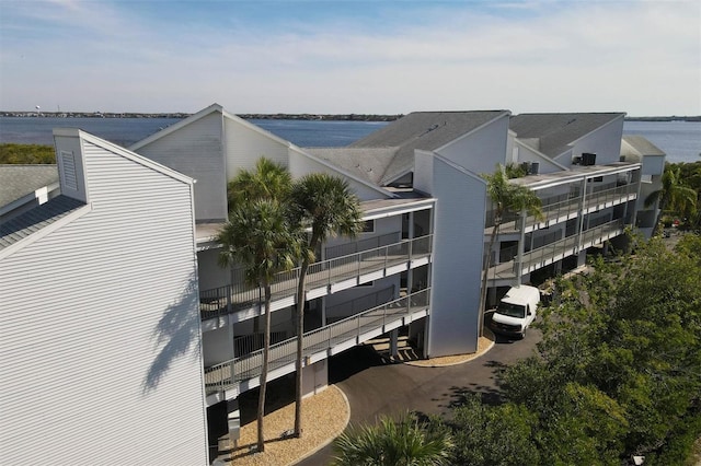 view of property with a water view