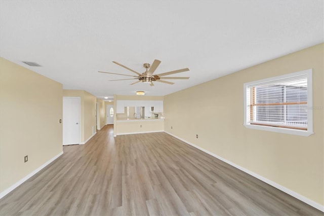 interior space featuring light hardwood / wood-style flooring and ceiling fan