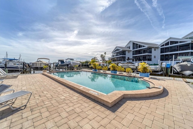 view of swimming pool featuring a patio