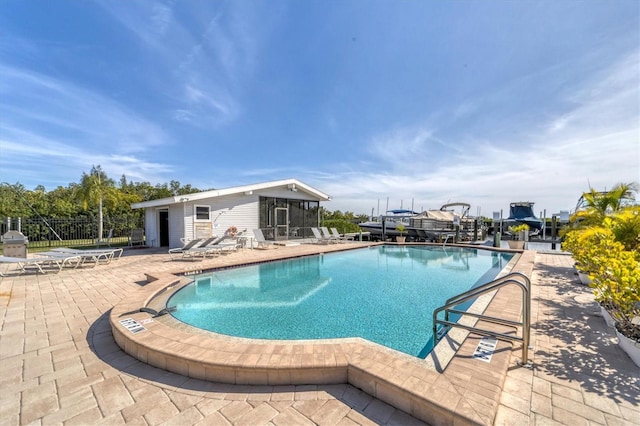 view of pool featuring a patio area