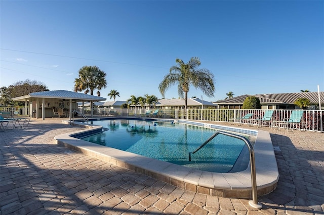 view of swimming pool featuring a patio