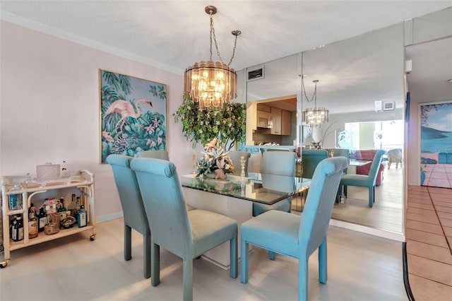 dining space with a chandelier