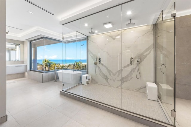 bathroom featuring separate shower and tub and tile patterned flooring