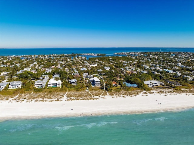 drone / aerial view with a view of the beach and a water view