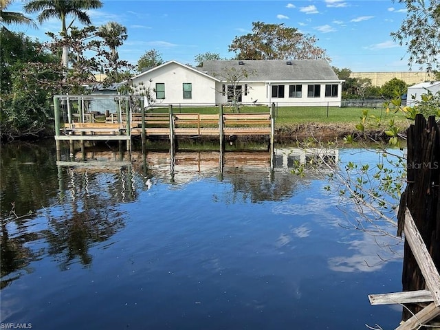 dock area with a water view