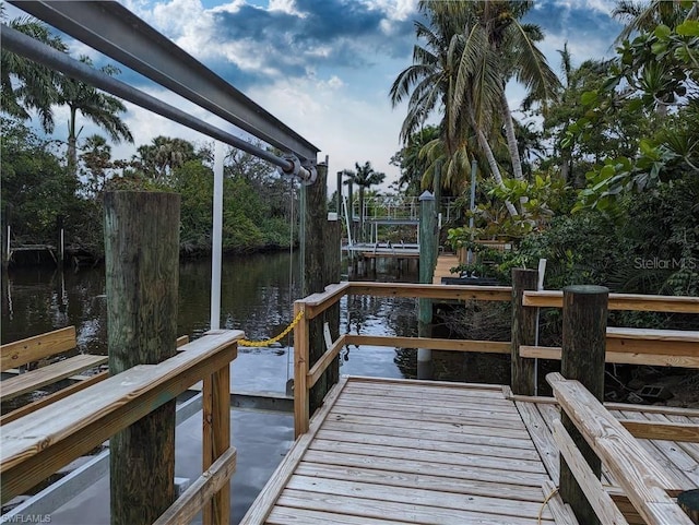 view of dock with a water view