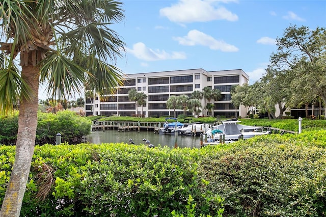 view of building exterior with a water view