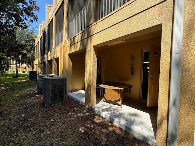 exterior space featuring central AC unit