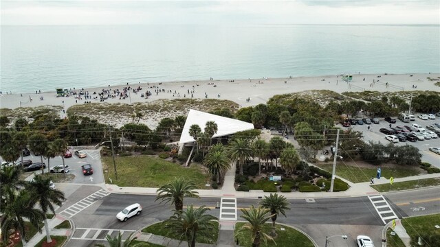 bird's eye view with a beach view and a water view